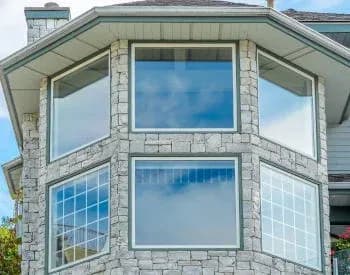 Damaged or aging windows in Milwaukee, WI home showing signs of wear, indicating the need for replacement by Empire Home Remodeling
