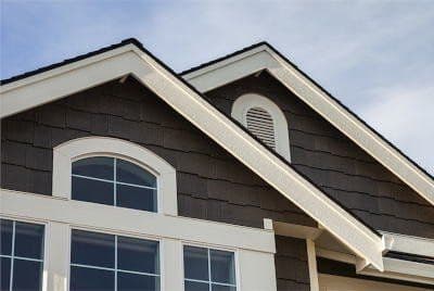 Shake siding installation by Empire Home Remodeling in Milwaukee, WI featuring cedar-style vinyl panels for a timeless, durable exterior finish