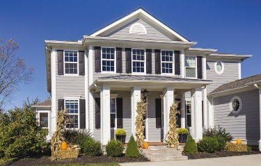 Vinyl siding installation on a Milwaukee, WI home by Empire Home Remodeling, featuring durable, low-maintenance, and energy-efficient exterior materials